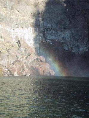 The rainbow from at the side. This is a tricky picture since I'm shooting at the boundary of direct sun an deep shadow, trying to capture shimmering light floating in mid air. Not sure the exposure, but it was bracketed. 