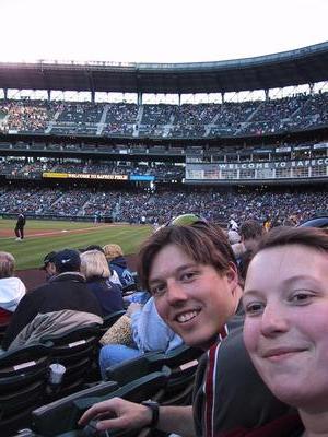 Scott got me the ticket to the game, and he even got one for his sister. (and her roomate too, but she's not in the picture)