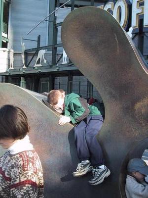 People interact with this piece of art. Seems to be a pretty successful work of public art.